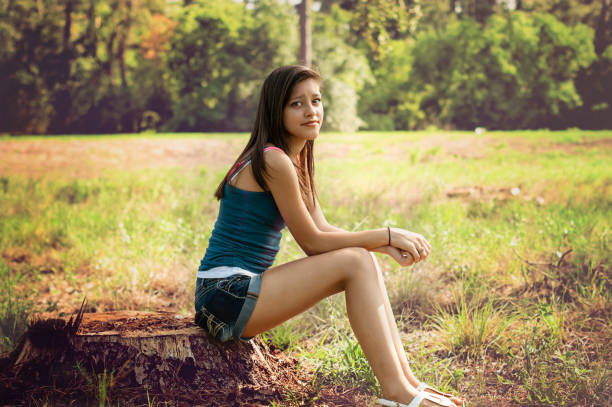 Girl alone thinking in a park in Houston, Texas