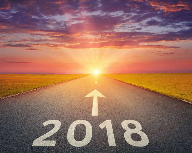 istock Empty highway to upcoming 2018 at sunset 645952272