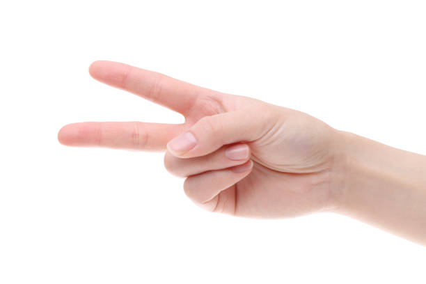 istock woman hand shows victory gesture 645952726