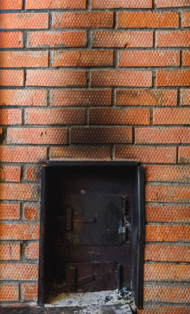 istock iron stove in the Russian bath lined with red brick 645952906