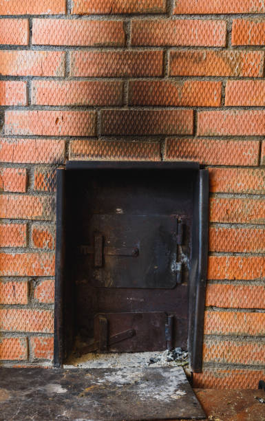 istock iron stove in the Russian bath lined with red brick 645952964
