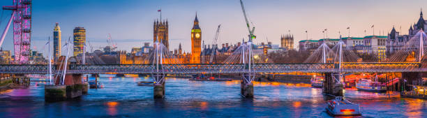 istock London Big Ben Westminster landmarks illuminated at sunset Thames panorama 645971606