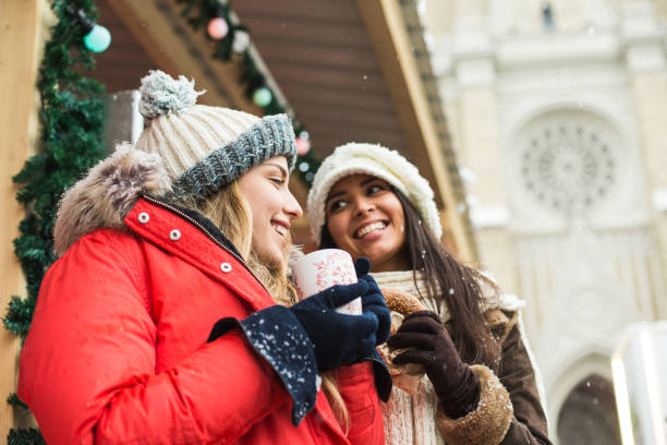 istock Two women at Christmas market 645990580