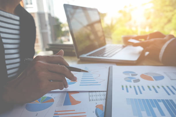 istock Business people discussing the charts and graphs 645993764