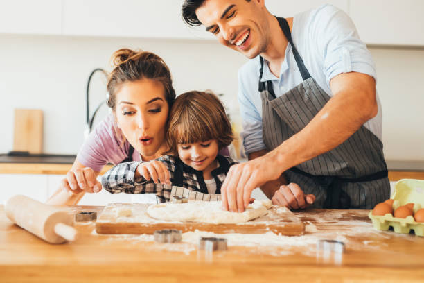 istock Family making cookies in the kitchen 645994390