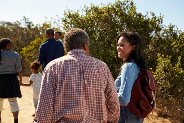 istock Multi Generation Family Walking In Countryside Together 646011788