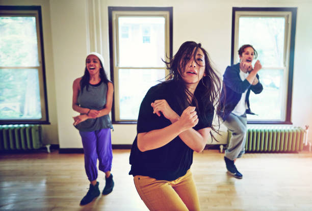 istock Hip hop dancers doing what they so best 646014570