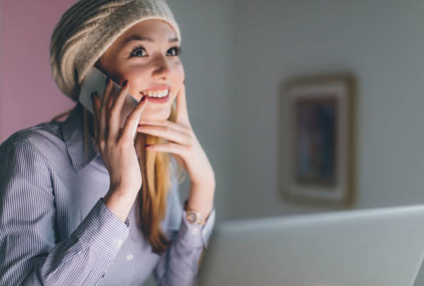 PC and phone and woman