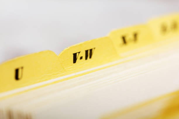 istock Close up of alphabetical index cards in box 646023412