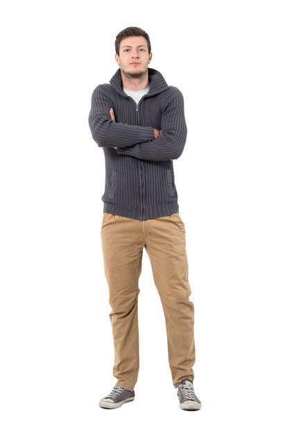 istock Confident young successful casual man in jumper with crossed arms. 646024768