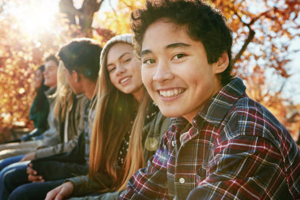 My go to people for happy times Portrait of a group of young friends enjoying a day at the park together teenagers only stock pictures, royalty-free photos & images
