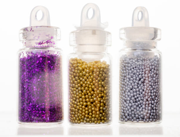 istock purple gold and silver nail decoration balls & glitters 646035940