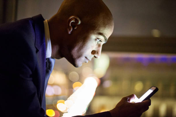 istock African businessman using smart phone in office 646036284