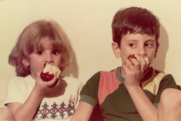 istock Vintage children eating apples 646037032