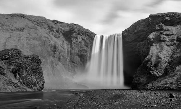 istock Skogafoss waterfall in Iceland in black and white 646040674