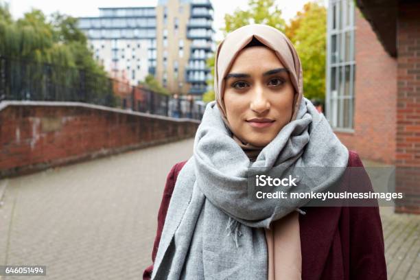 Portrait Of British Muslim Woman In Urban Environment Stock Photo - Download Image Now