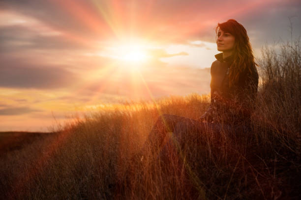 istock Thoughtful woman and beautiful sunset 646055390