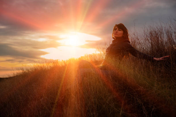 istock Thoughtful woman and beautiful sunset 646055422