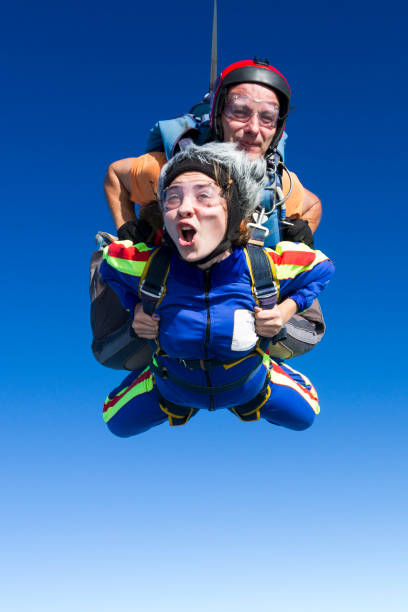 istock Tandem jump. Flying in a free fall. 646057890