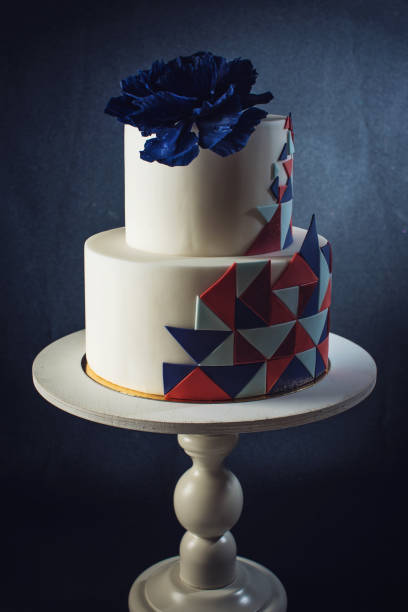 istock Beautiful wedding cake decorated with large blue rose on top 646062374