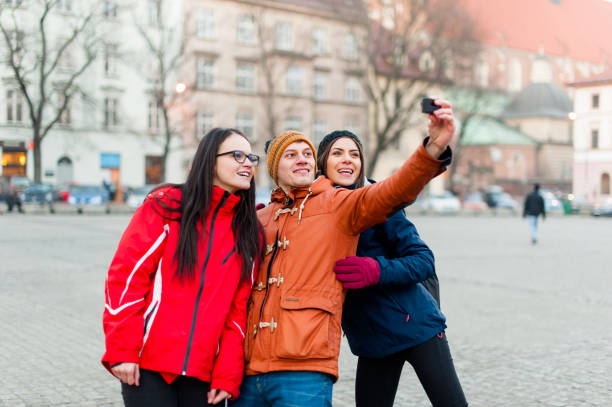 istock Friends taking a selfie with wearable camera 646065112
