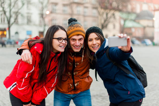 istock Friends having fun and taking pictures 646065558