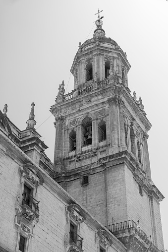 Jaen, Spain - July 18, 2016: ùJaen (Andalucia, Spain): the medieval cathedral, built from 13th to 18th century, in Baroque style. Belfry. Black and white