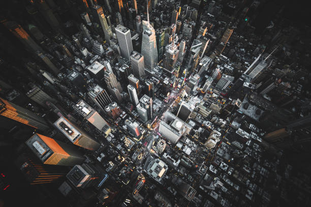 luftaufnahme des times square bei nacht - new york city built structure building exterior aerial view stock-fotos und bilder