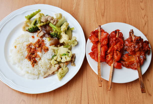 istock fried mixed vegetable with rice and grilled chicken 646074390