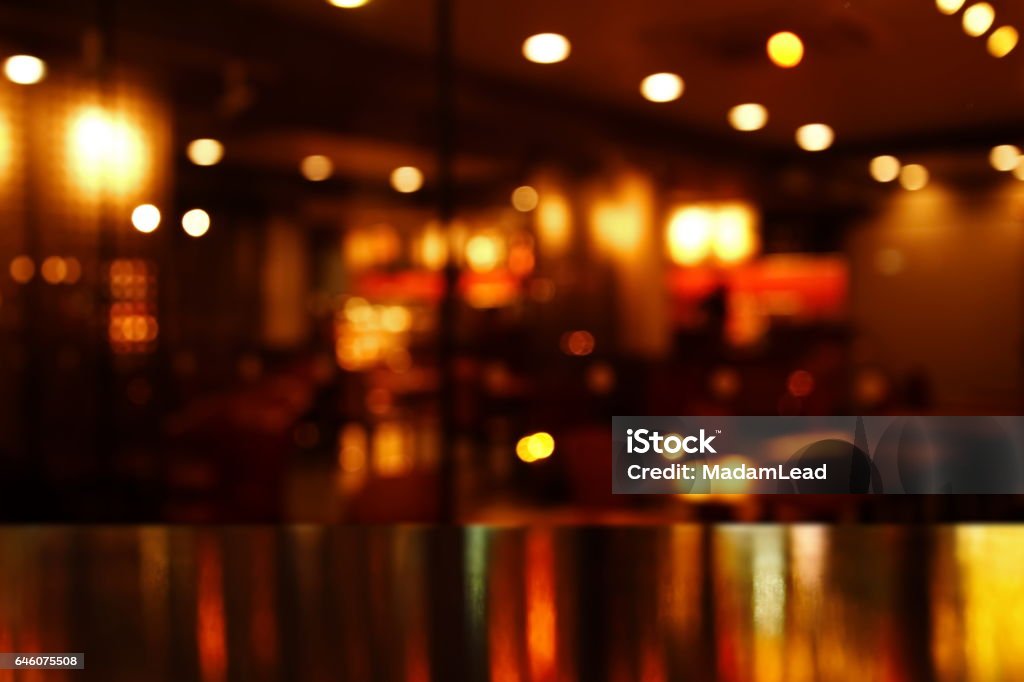 reflection light on table in bar and pub at night reflection light on table in bar and pub at night background Bar Counter Stock Photo