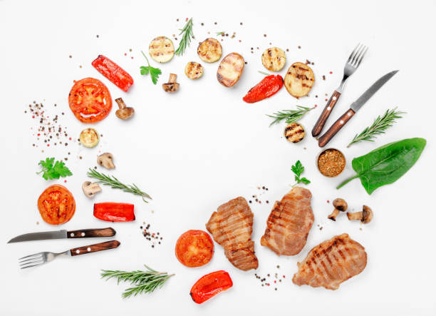 istock Frame of different food grilled on a white background 646085460