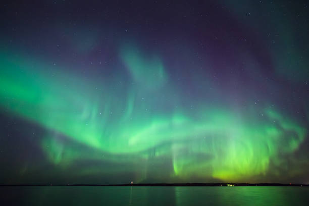 istock Northern lights over lake in finland 646088266