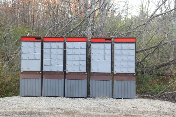 istock Mail boxes , trees in background, gravel 646088796