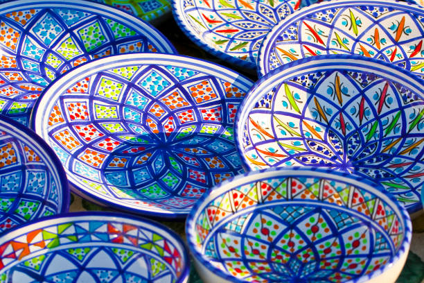 istock Italian colored handmade dishes ceramics painted by hand with lozenges geometry 646091670