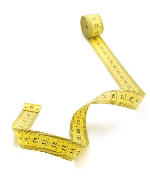 istock yellow measuring tape isolated on white 646096114