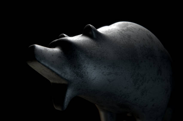 istock Metal casting depicting a stylized bear in dramatic light representing financial market trends 646109274