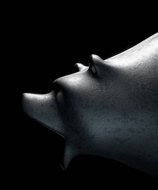Metal casting depicting a stylized bear in dramatic light representing financial market trends