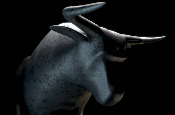 istock Metal casting depicting a stylized bull in dramatic light representing financial market trends 646113062
