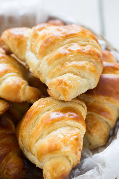 istock Homemade croissants in a basket 646113728