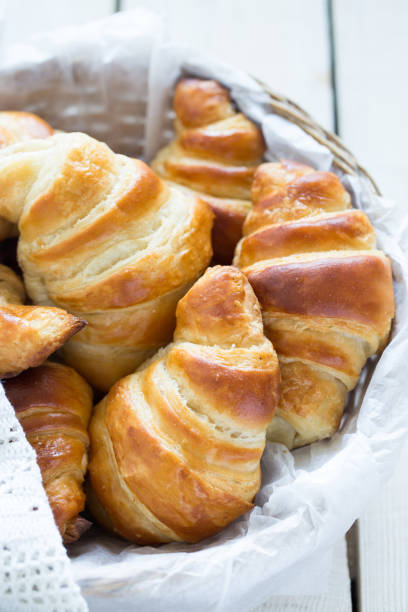 istock Homemade croissants in a basket 646113732
