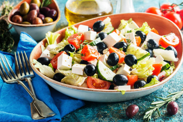 istock Greek salad with fresh vegetables 646120074
