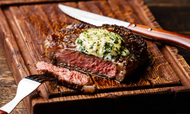 istock Grilled steak Rib eye with herb butter 646120138