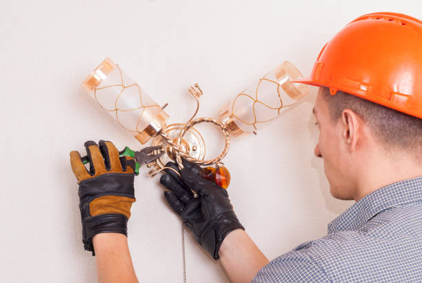 electrician with pliers stock photo