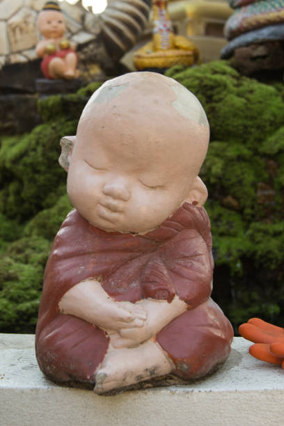 istock Novice little doll sculpture at Wat Phra That Doi Kham 646120870