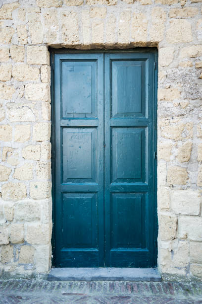 istock Wooden Ancient Italian Door 646121218