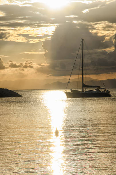 istock Sailing boat heads towards the sunset 646141862