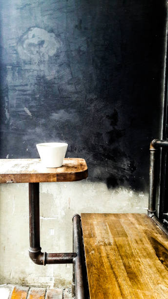 istock Cup of coffee or tea at cafe on wooden surface. 646142954