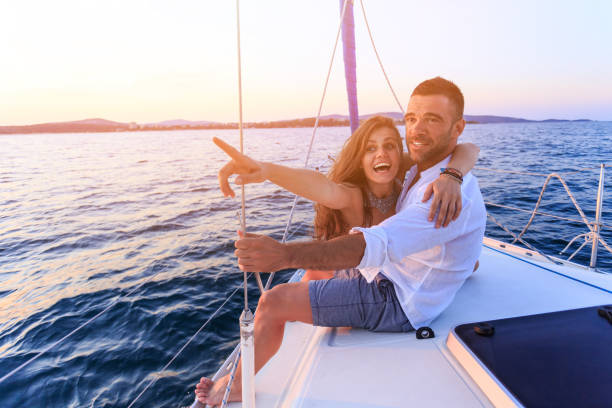 istock Young people having romantic trip with yacht in sea 646143448