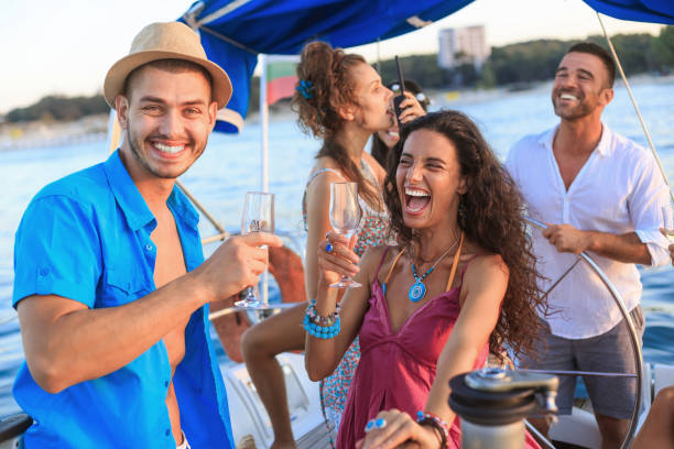 istock Group of young people having party and drinking 646147300