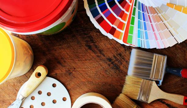 istock various painting tools and color palette on wooden background 646154852